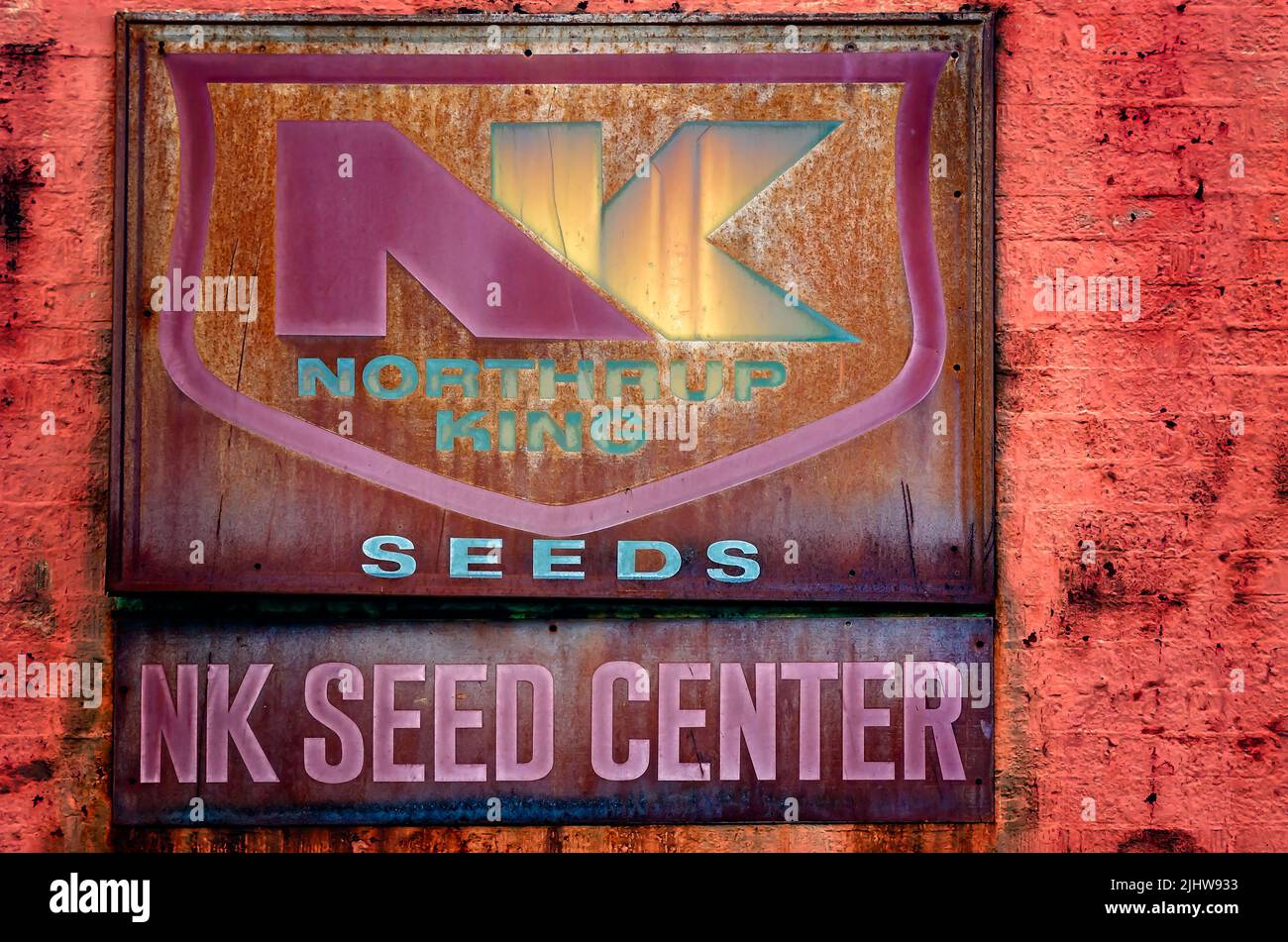 A vintage sign on a county co-op advertises Northrup King Seeds, July 17, 2022, in Grand Bay, Alabama. Northrup-King Seed Company was founded in 1896. Stock Photo