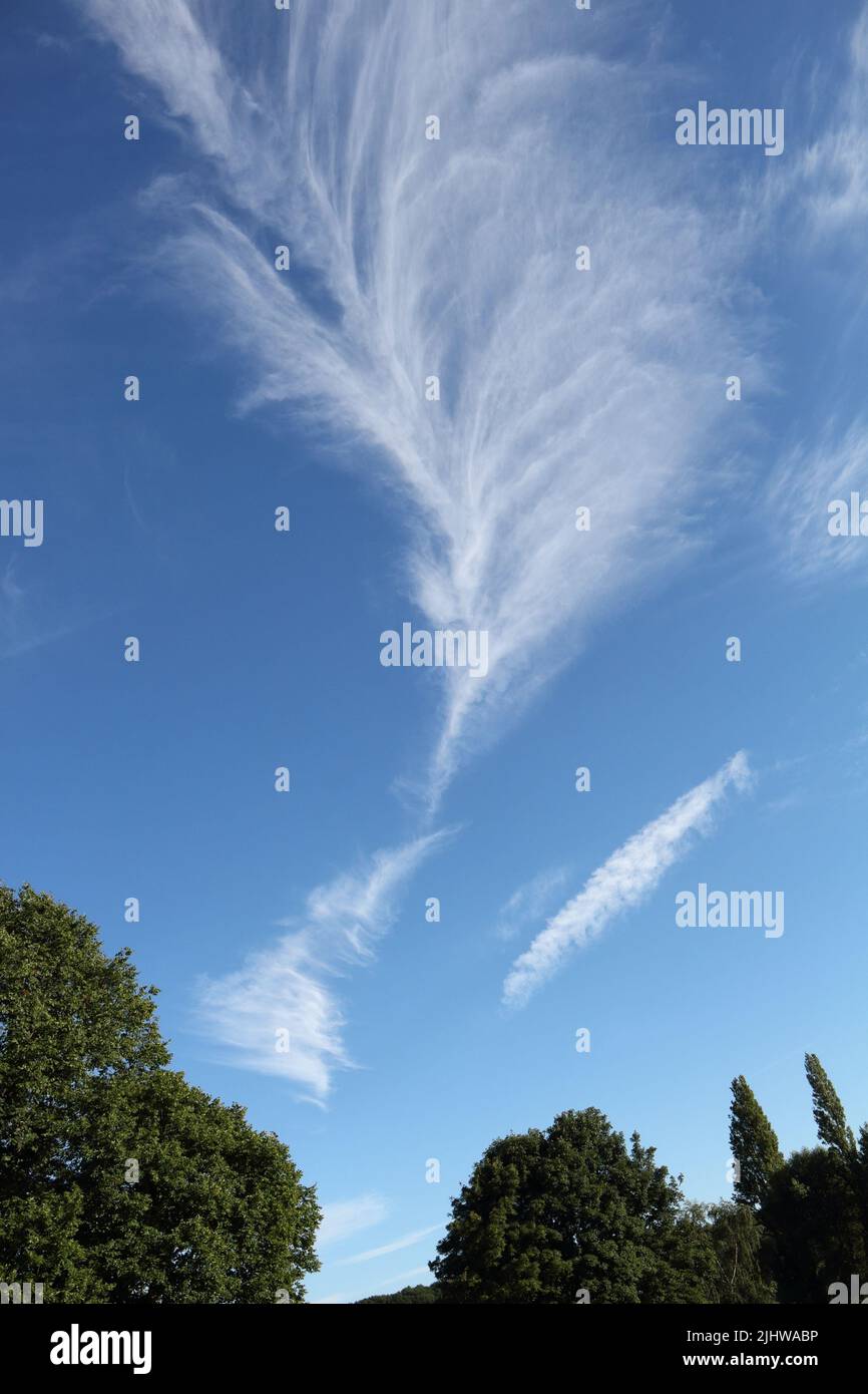 Long cloud, blue sky, summer weather Stock Photo