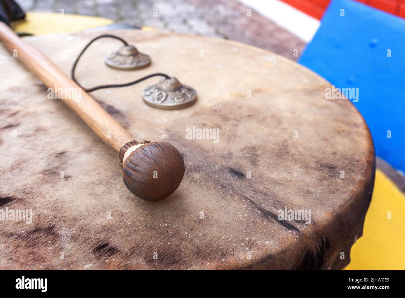 Close-up of drum and meditation bells. Shamanic percussion instruments Stock Photo