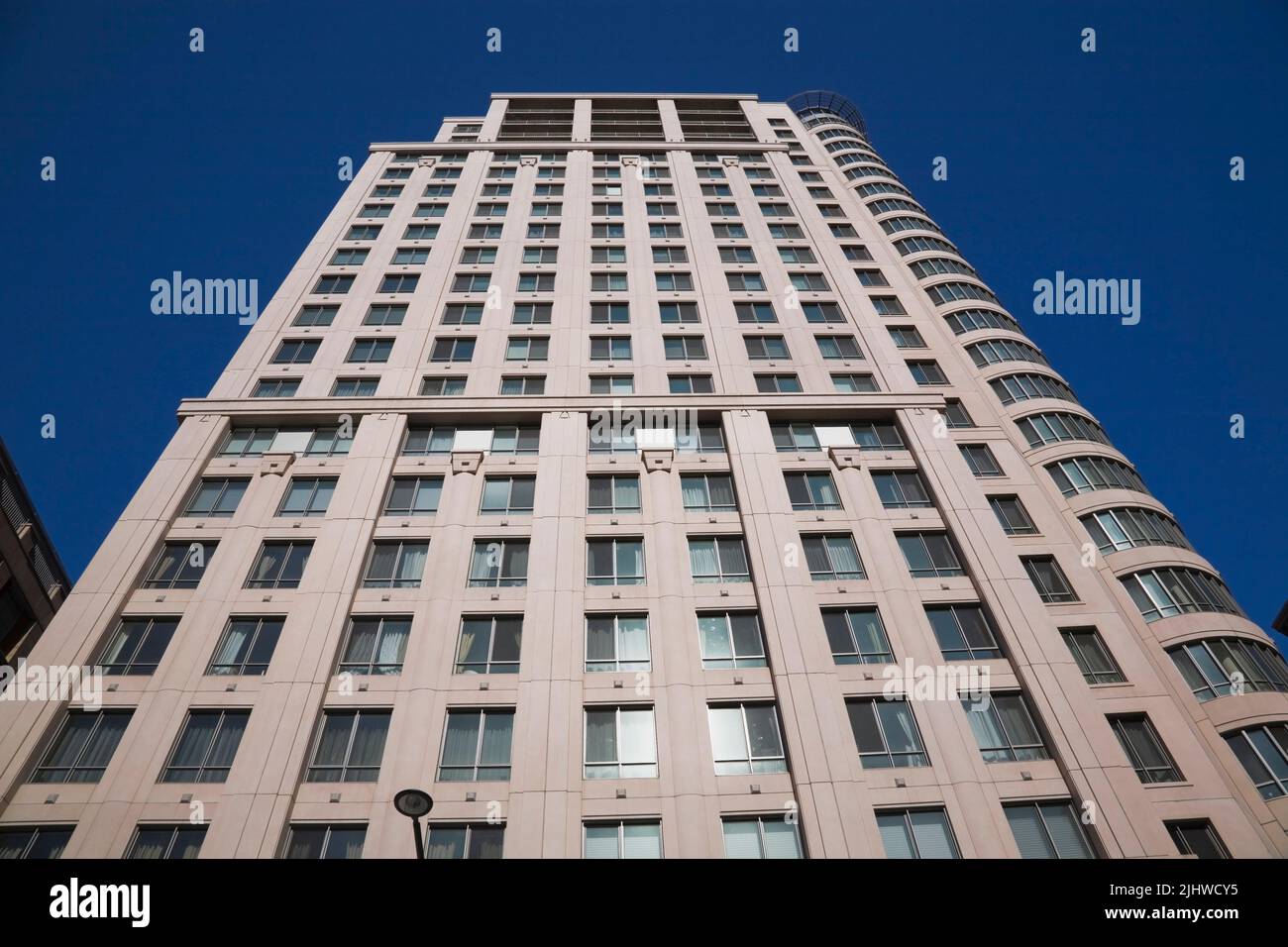 Modern architectural building against a blue sky background Stock Photo ...