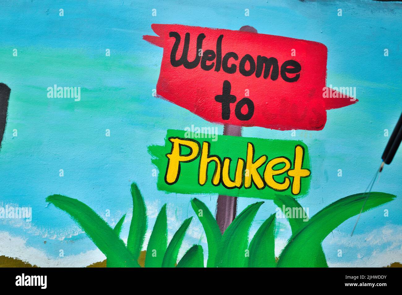 'Welcome To Phuket' graffiti on a house wall in Phuket Town (Phuket City), Phuket, Thailand Stock Photo
