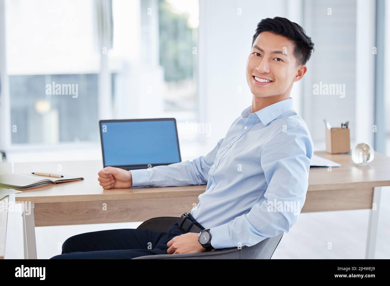 Ive got work to do. a young businessman using a laptop at work. Stock Photo