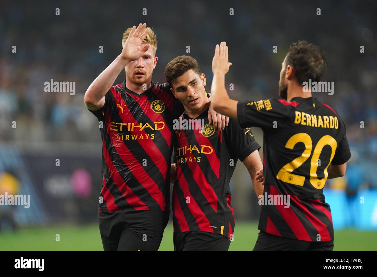 Manchester City's Kevin De Bruyne (left) celebrates scoring their side's first goal of the game during a pre-season friendly match at NRG Stadium, Houston. Picture date: Wednesday July 20, 2022. Stock Photo