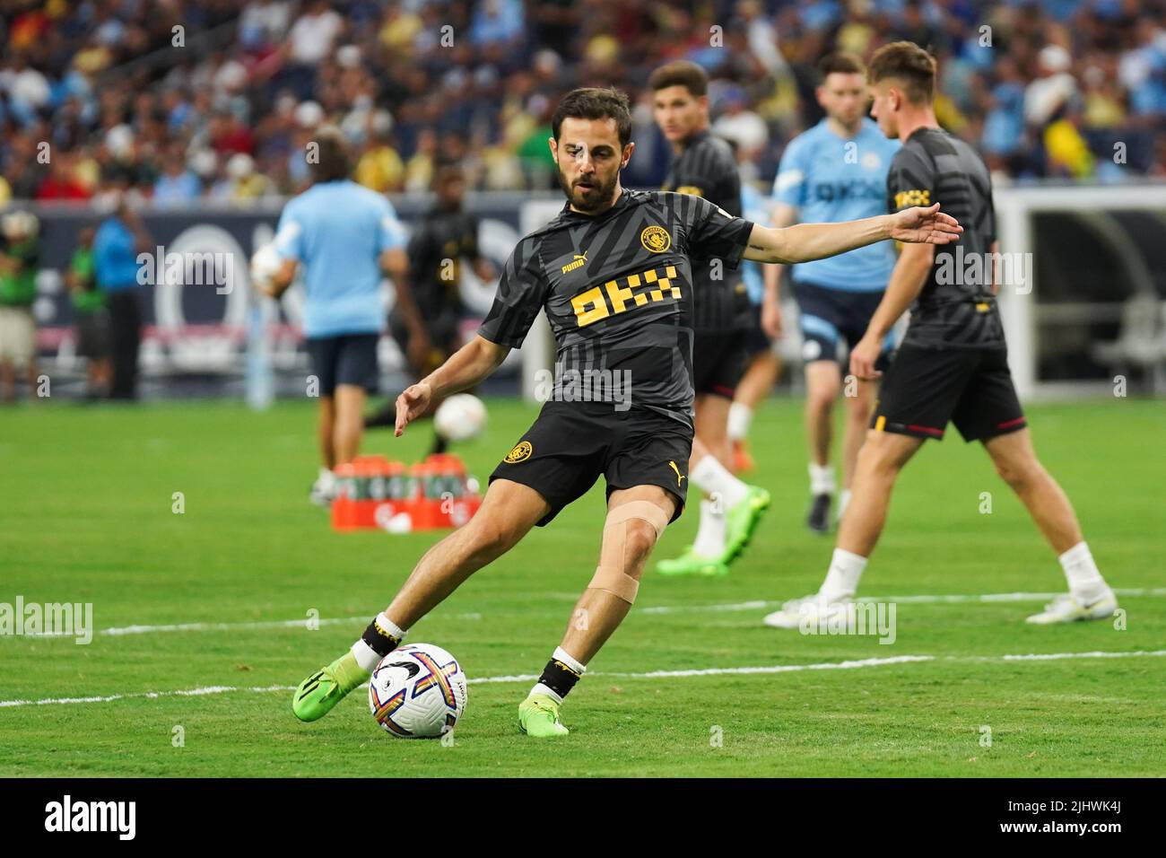 Manchester City's Bernardo Silva warms up ahead of a pre-season friendly match at NRG Stadium, Houston. Picture date: Wednesday July 20, 2022. Stock Photo
