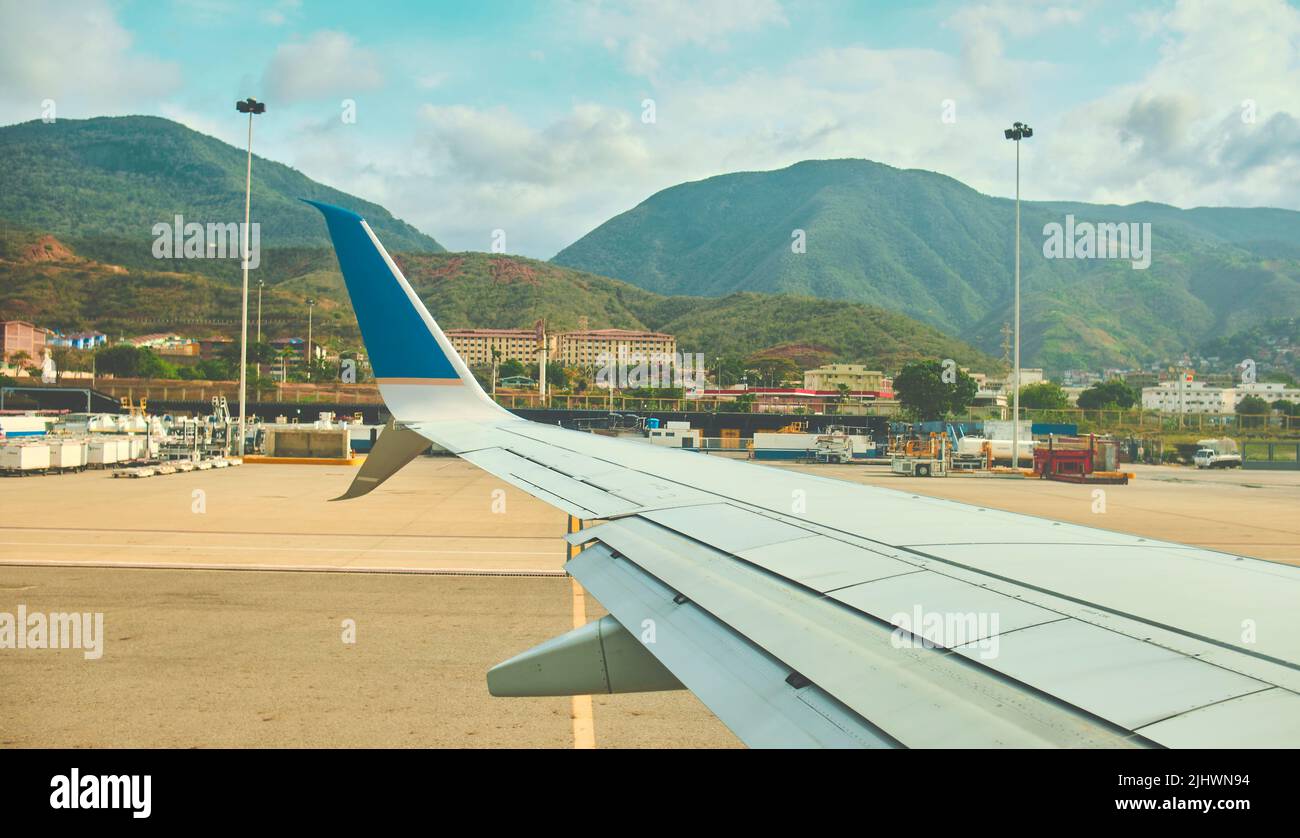 CARACAS, VENEZUELA - 2022: Airplane window view of Simon Bolivar Airport, Maiquetia - Venezuela. Stock Photo