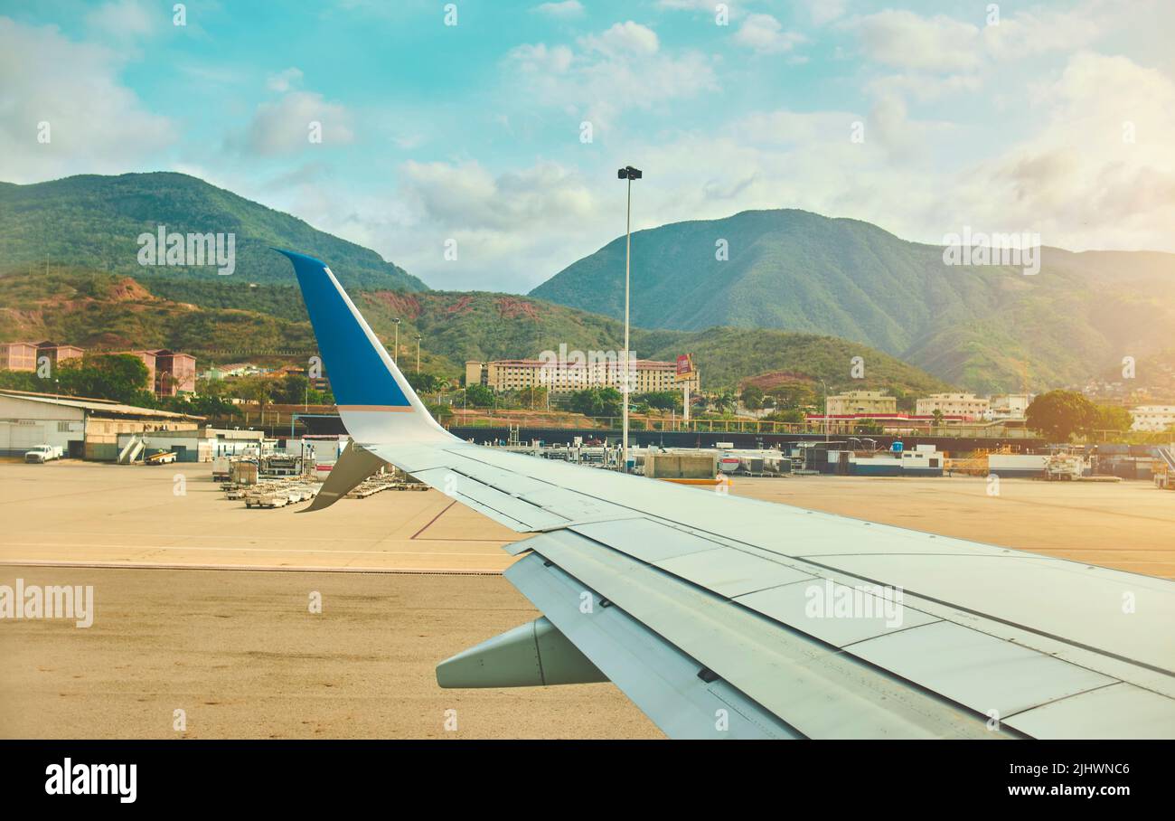 CARACAS, VENEZUELA - 2022: Airplane window view of Simon Bolivar Airport, Maiquetia - Venezuela. Stock Photo