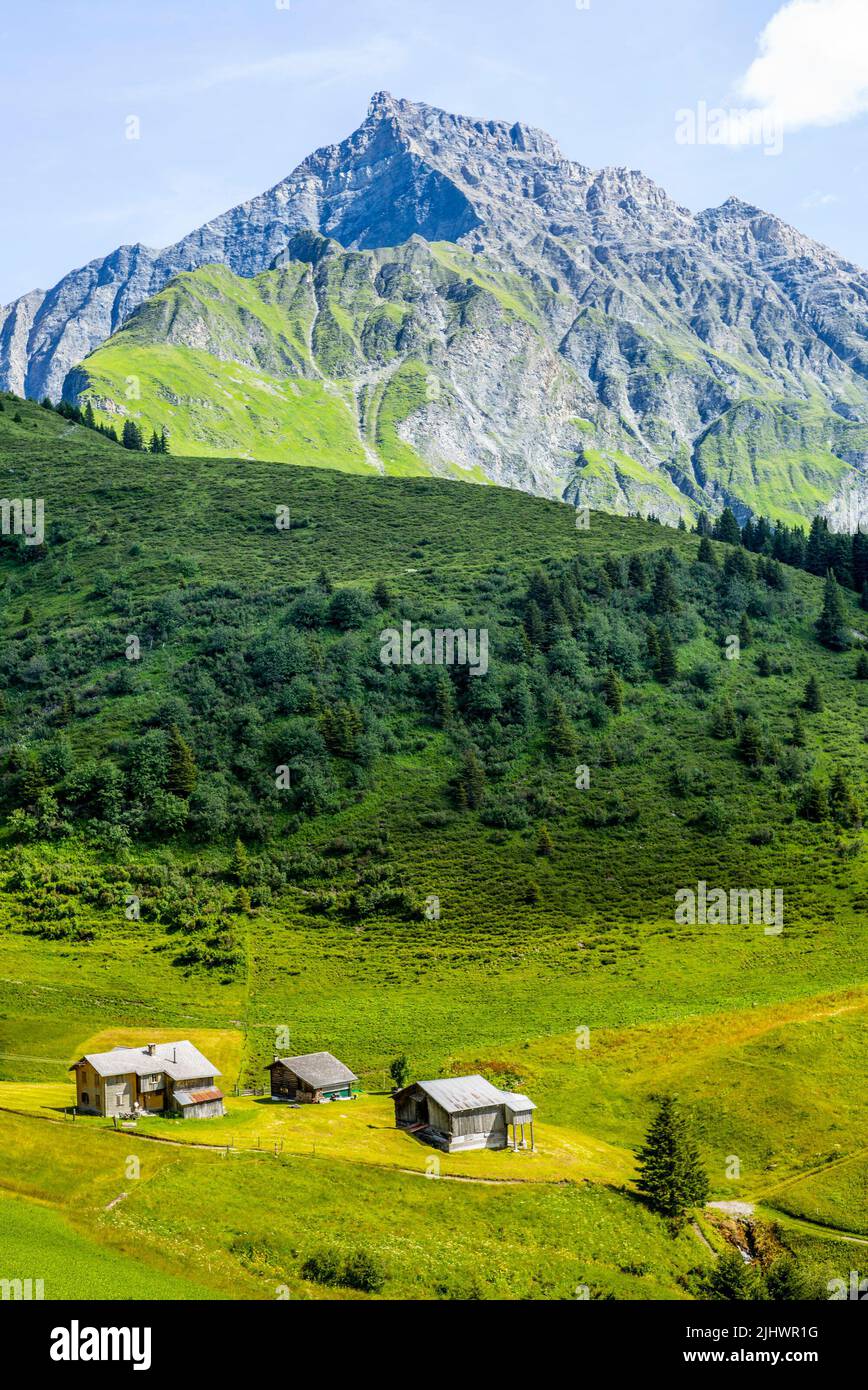 Old alpine farms at the bottom of the Piz Beverin in Switzerland in ...