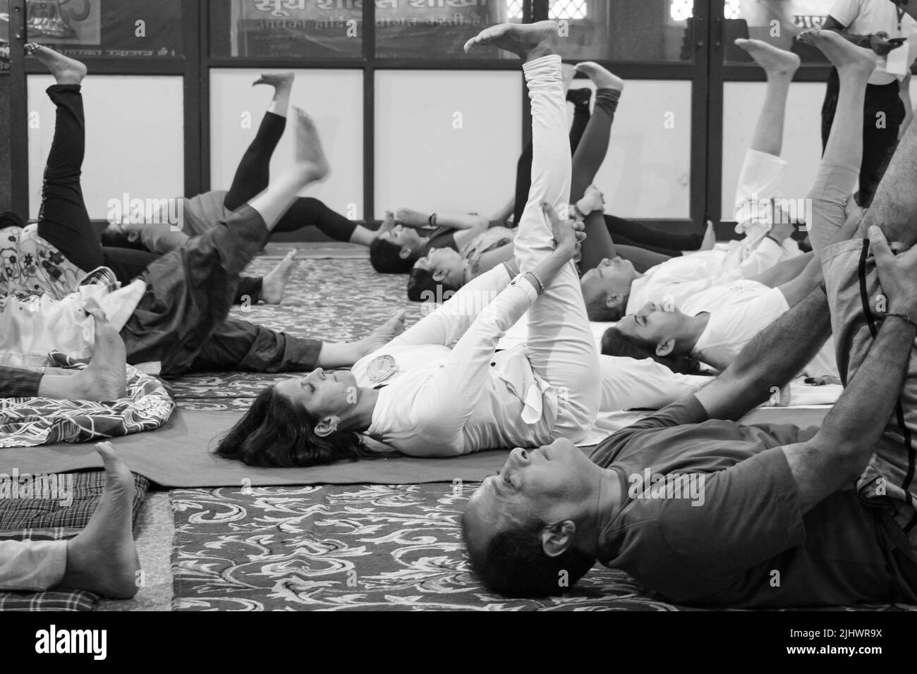 Delhi, India, June 19 2022Group Yoga exercise session for people of