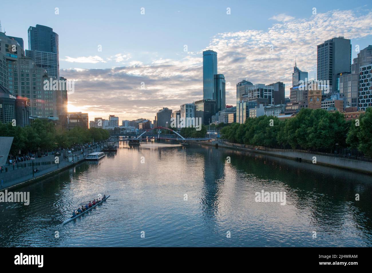 Rowers on the Yarra on a summer evening Stock Photo