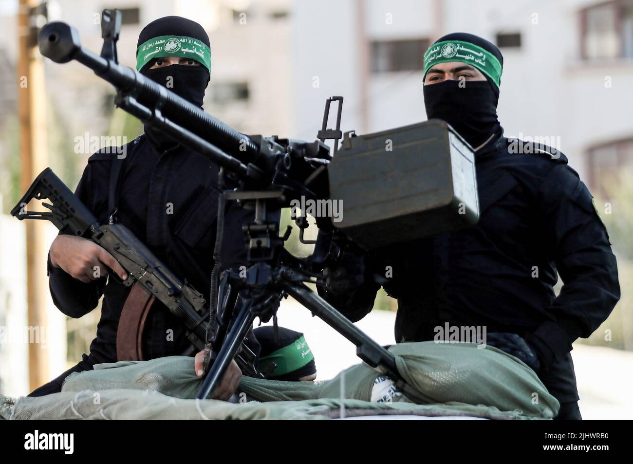 Gaza, Palestine. 20th July, 2022. Members of the Izz al-Din al-Qassam Brigades, the military wing of Hamas participate in an anti-Israel military parade in Gaza City. Credit: SOPA Images Limited/Alamy Live News Stock Photo