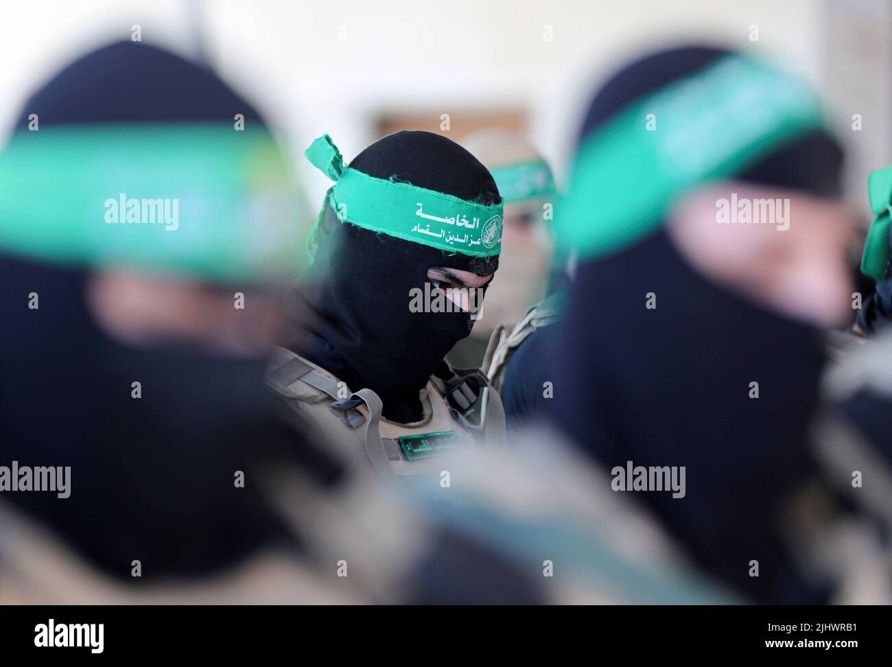 Gaza, Palestine. 20th July, 2022. Gunmen from the Izz al-Din al-Qassam Brigades, the military wing of Hamas during an anti-Israel military parade in Gaza City. Credit: SOPA Images Limited/Alamy Live News Stock Photo