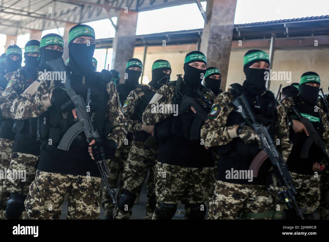 Gaza, Palestine. 20th July, 2022. Gunmen from the Izz al-Din al-Qassam Brigades, the military wing of Hamas during an anti-Israel military parade in Gaza City. Credit: SOPA Images Limited/Alamy Live News Stock Photo