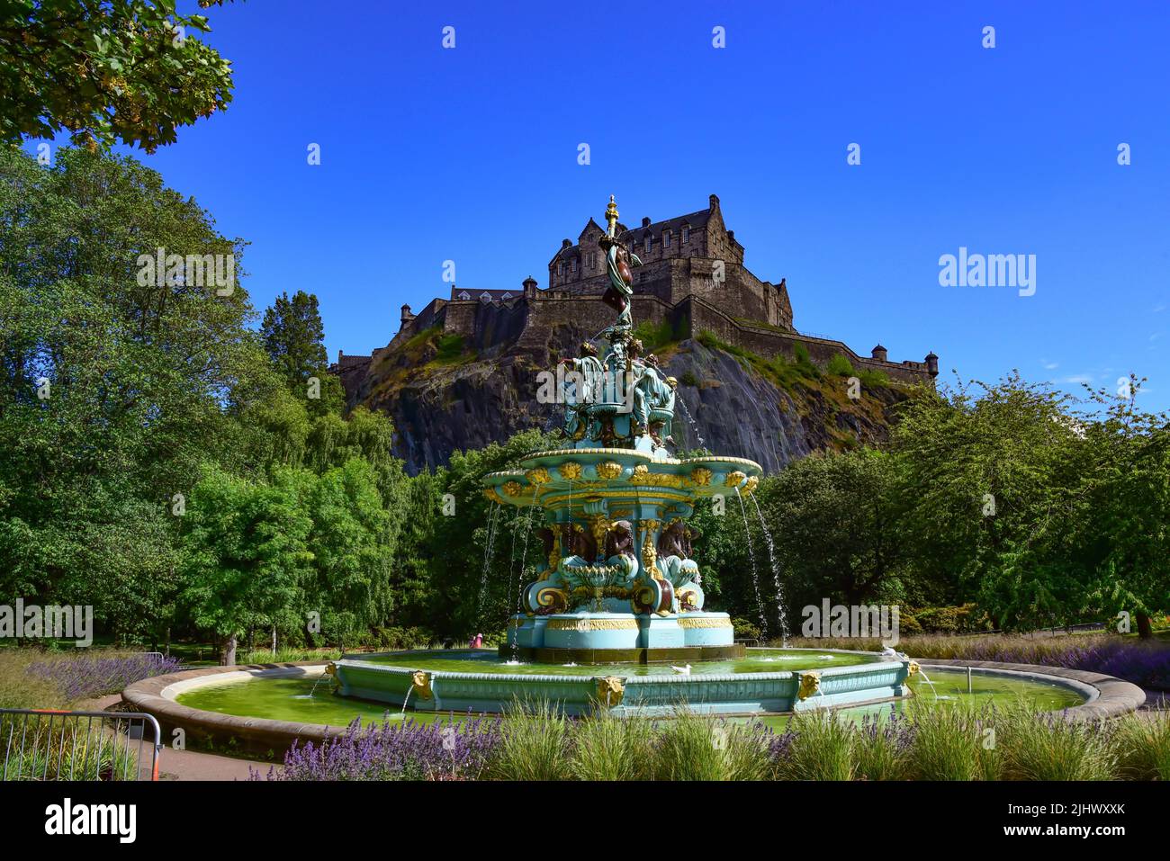 The Ross Fountain in Princess Street Gardens in Edinburgh with the Royal Castle on Castle Rock in the background, Scotland, United Kingdom, Europe Stock Photo