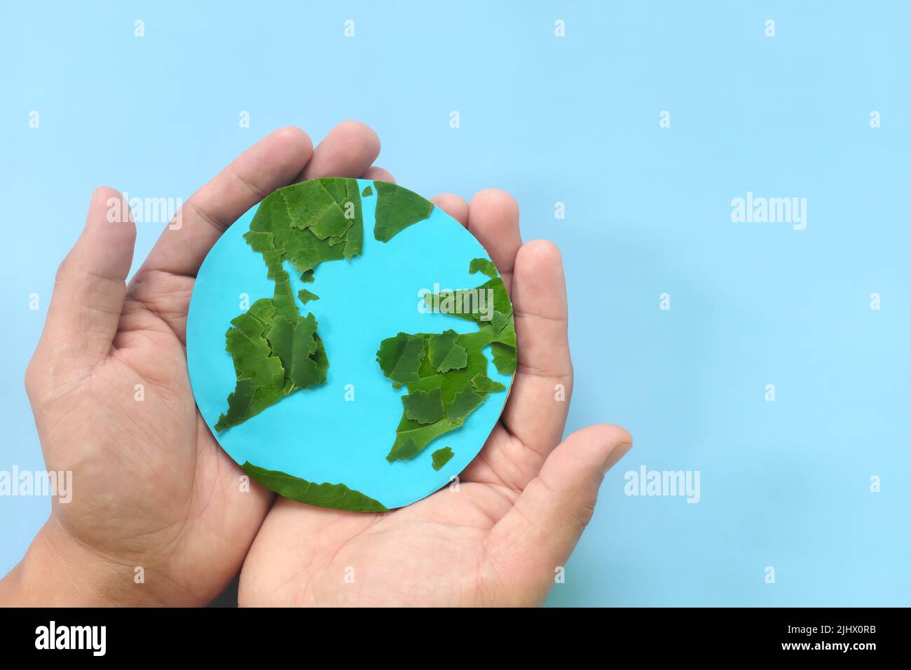 Hands holding earth globe tree in hi-res stock photography and images ...