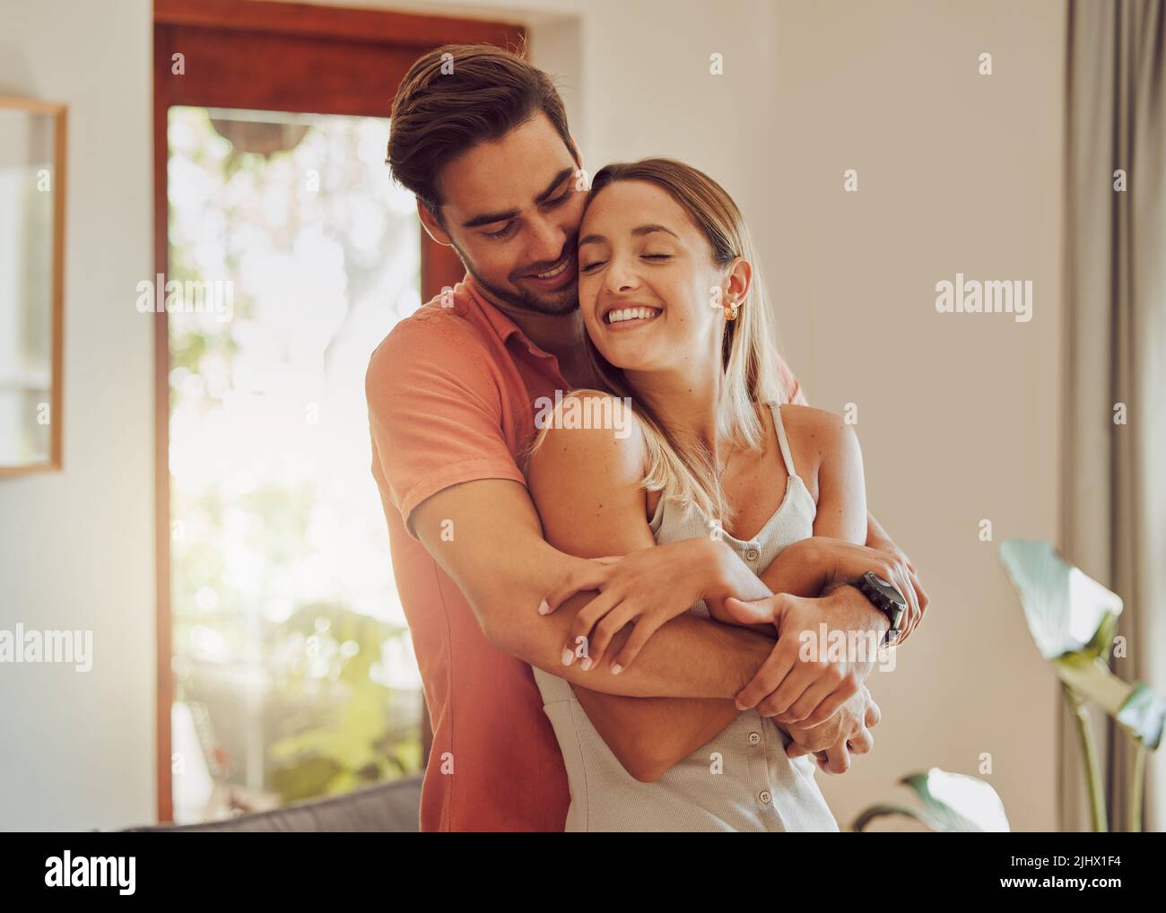 Cherishing these moments. a young couple spending time together at home. Stock Photo