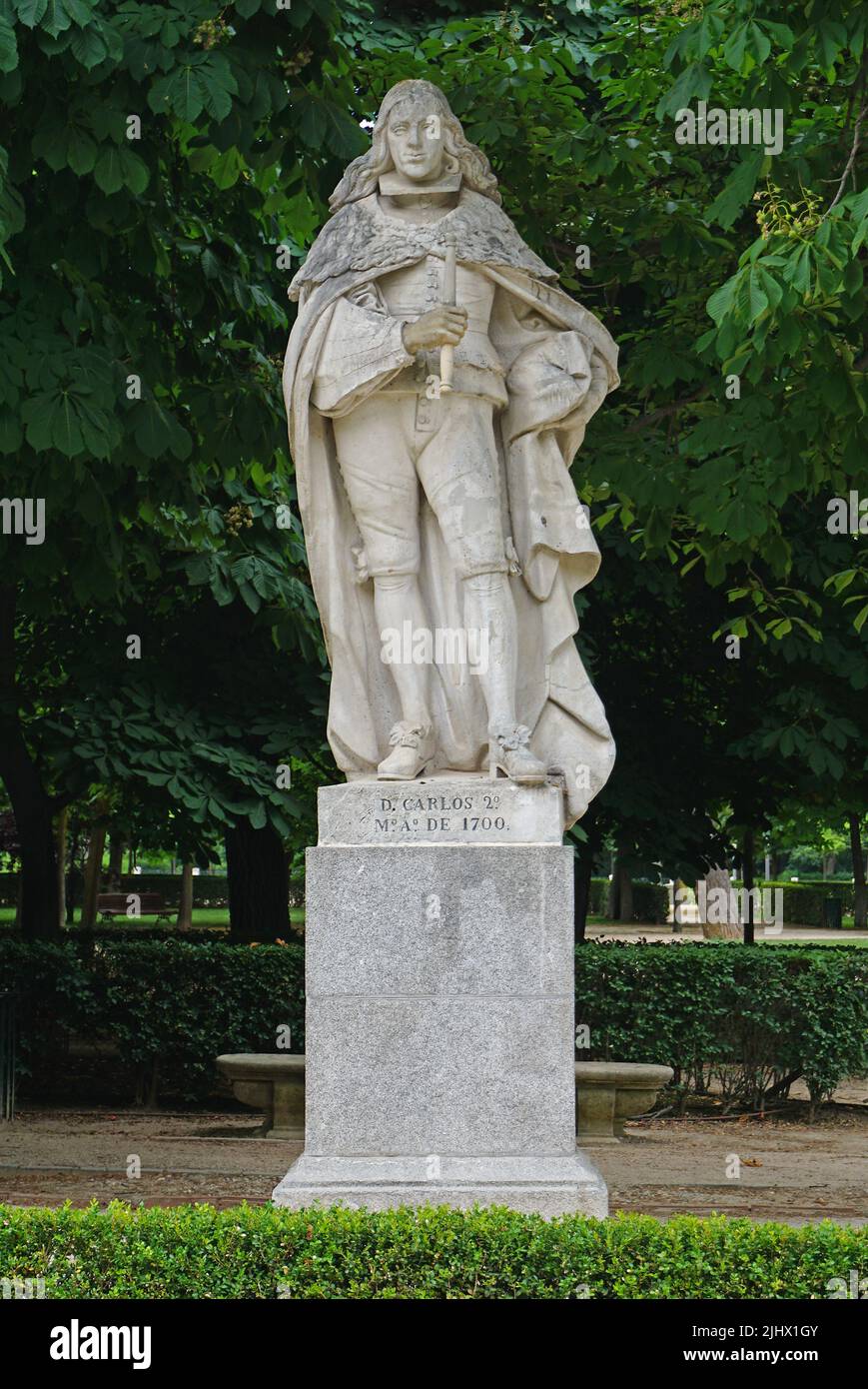 Statue of Charles II of Spain ( Carlos II ).Located at The Buen Retiro Park,Parque del Buen Retiro in Madrid, Spain.El Retiro  first belonged to the Spanish Monarchy.Late 19th century it became a public park. Stock Photo