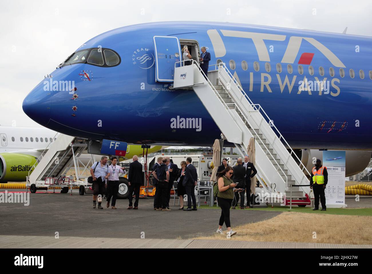 Farnborough, UK. 20th July, 2022. Aircraft manufacturers and component suppliers gathered at Farnborough for the first day of a three day trade show. Airbus showed their new A350-900 in the livery of ITA Airways. Stock Photo