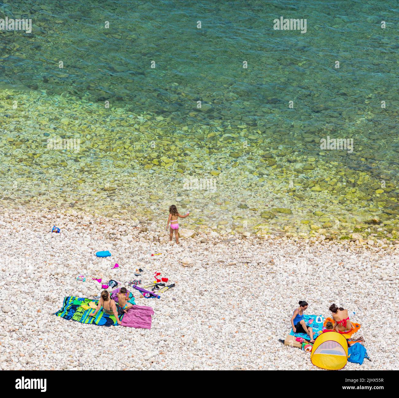 Villafranche-sur-Mer, Cote d'Azur, French Riviera, Alpes-Maritimes, France.  Quiet pebble beach. Stock Photo