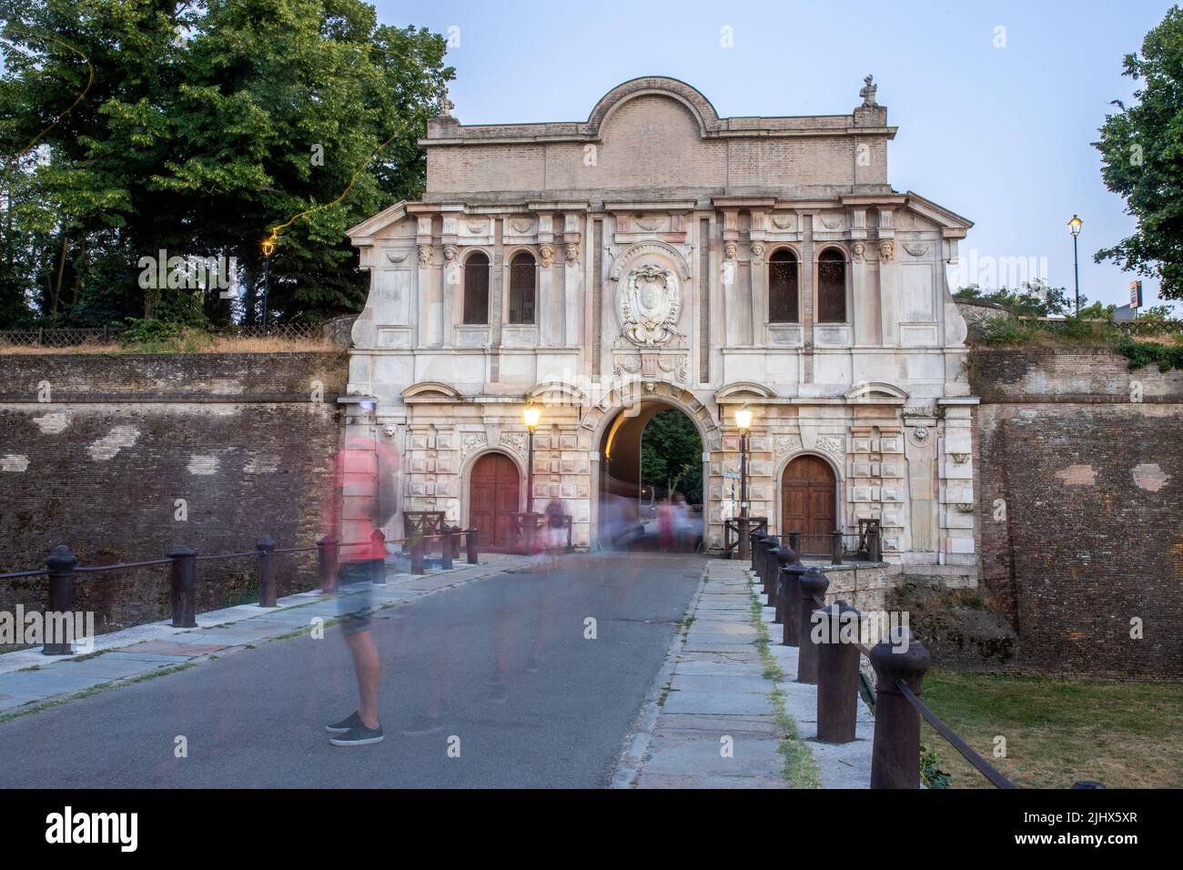 Entrance of the 'Citadel of Parma'. Ancient fortification with medieval walls today used as a park for physical activities. Stock Photo