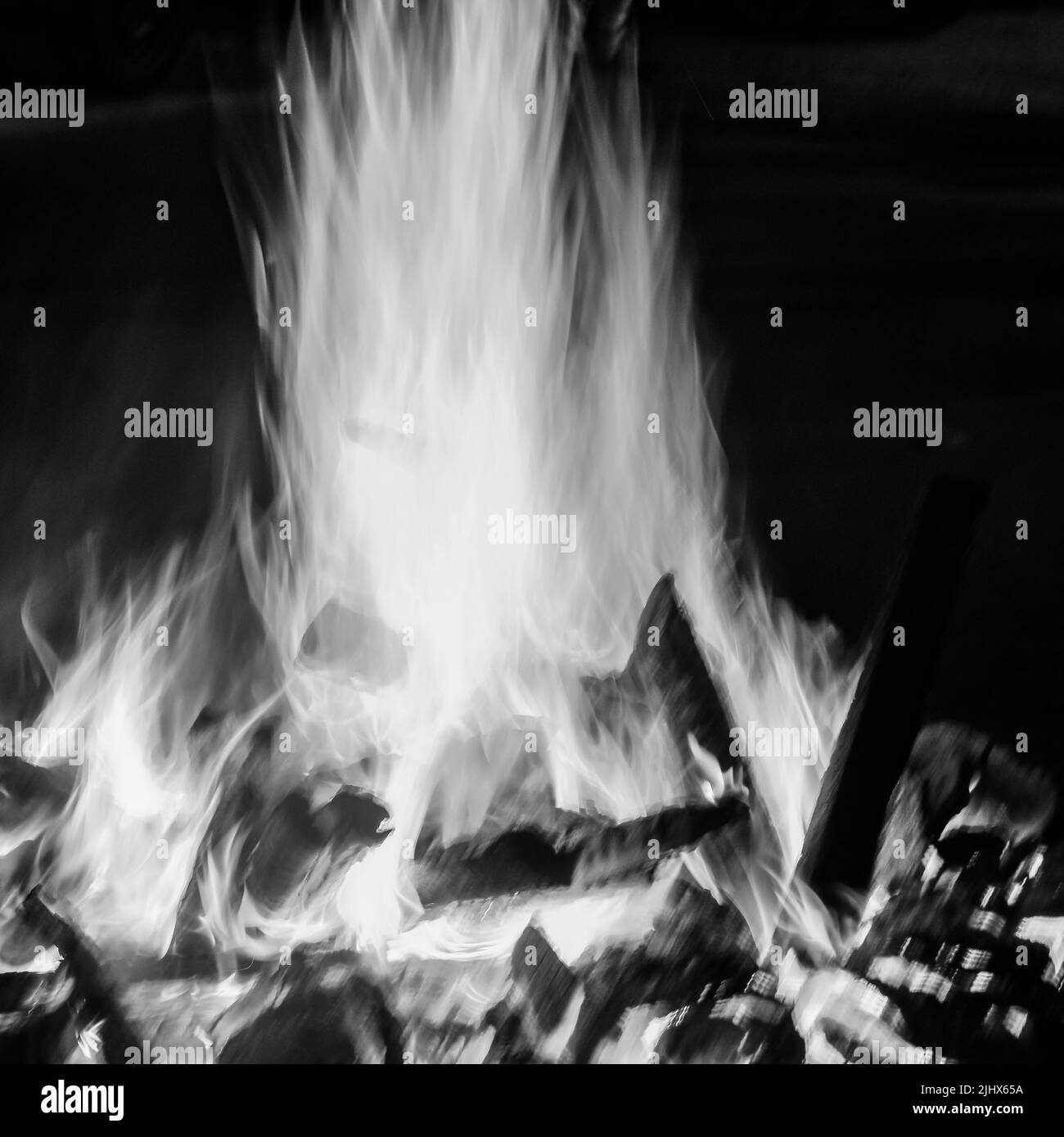 Fire flames on black background, Blaze fire flame texture background, Beautifully, the fire is burning, Fire flames with wood and cow dung bonfire Bla Stock Photo