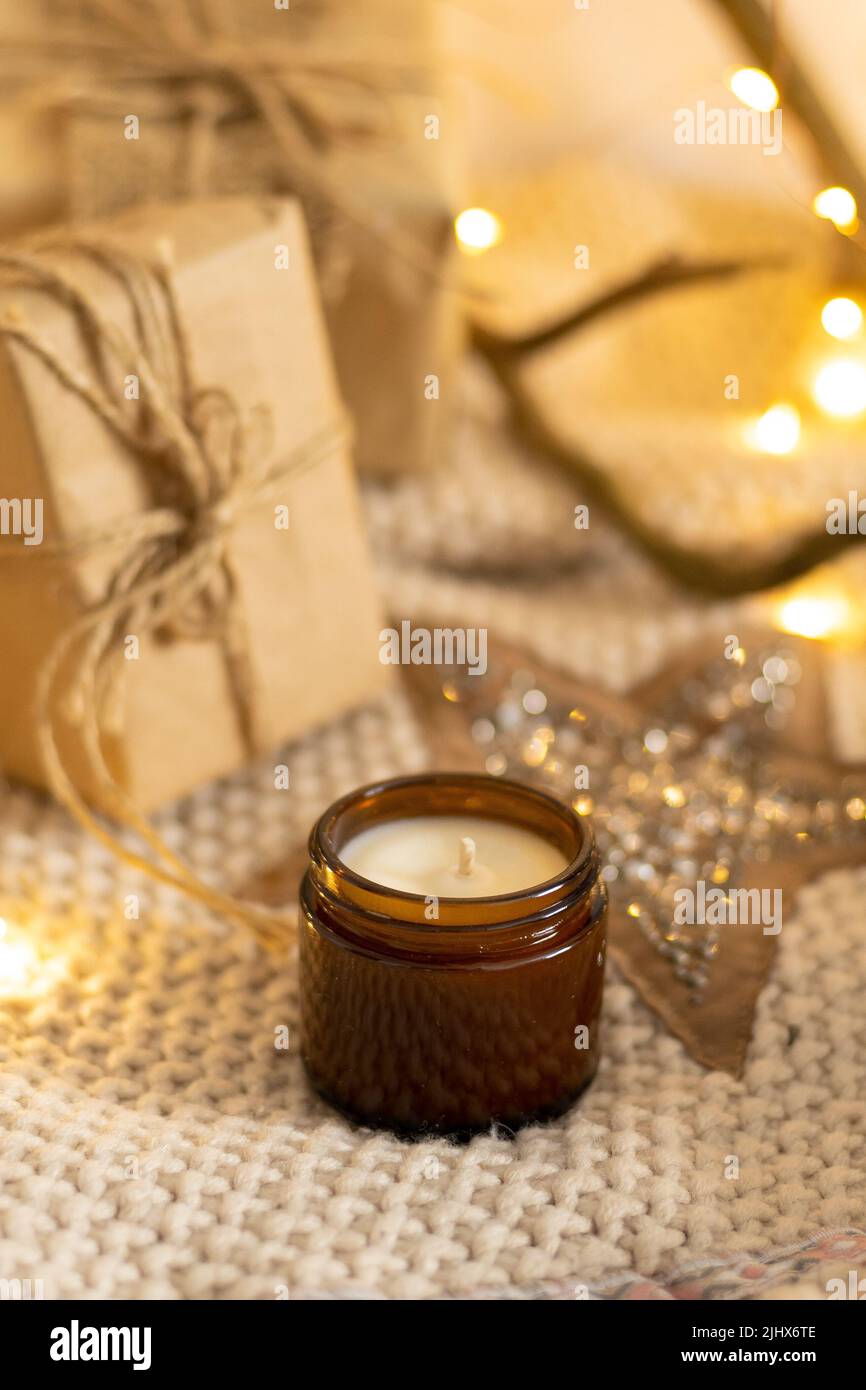 A set of different aroma candles in brown glass jars. Scented handmade ...