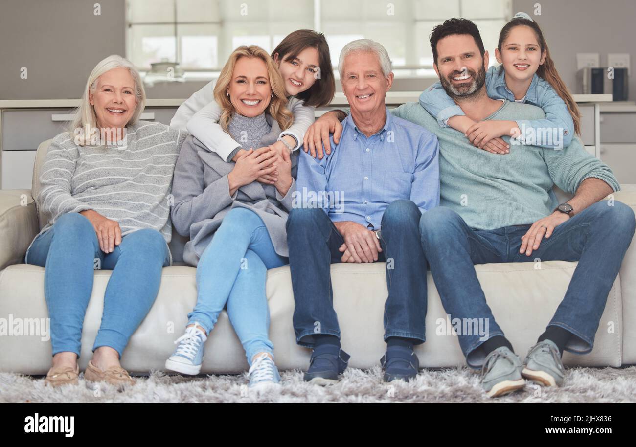 The ultimate hang. a family bonding on a sofa together at home. Stock Photo