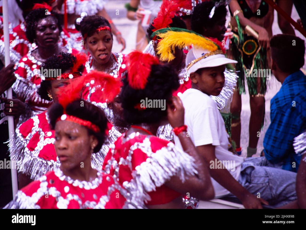 People in procession dancing on streets at Easter carnival, Kingston