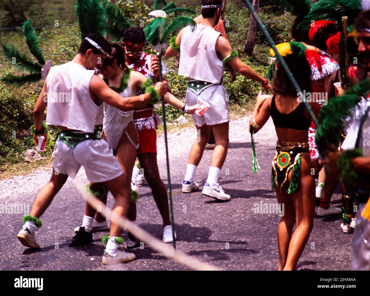 People in procession dancing on streets at Easter carnival, Kingston