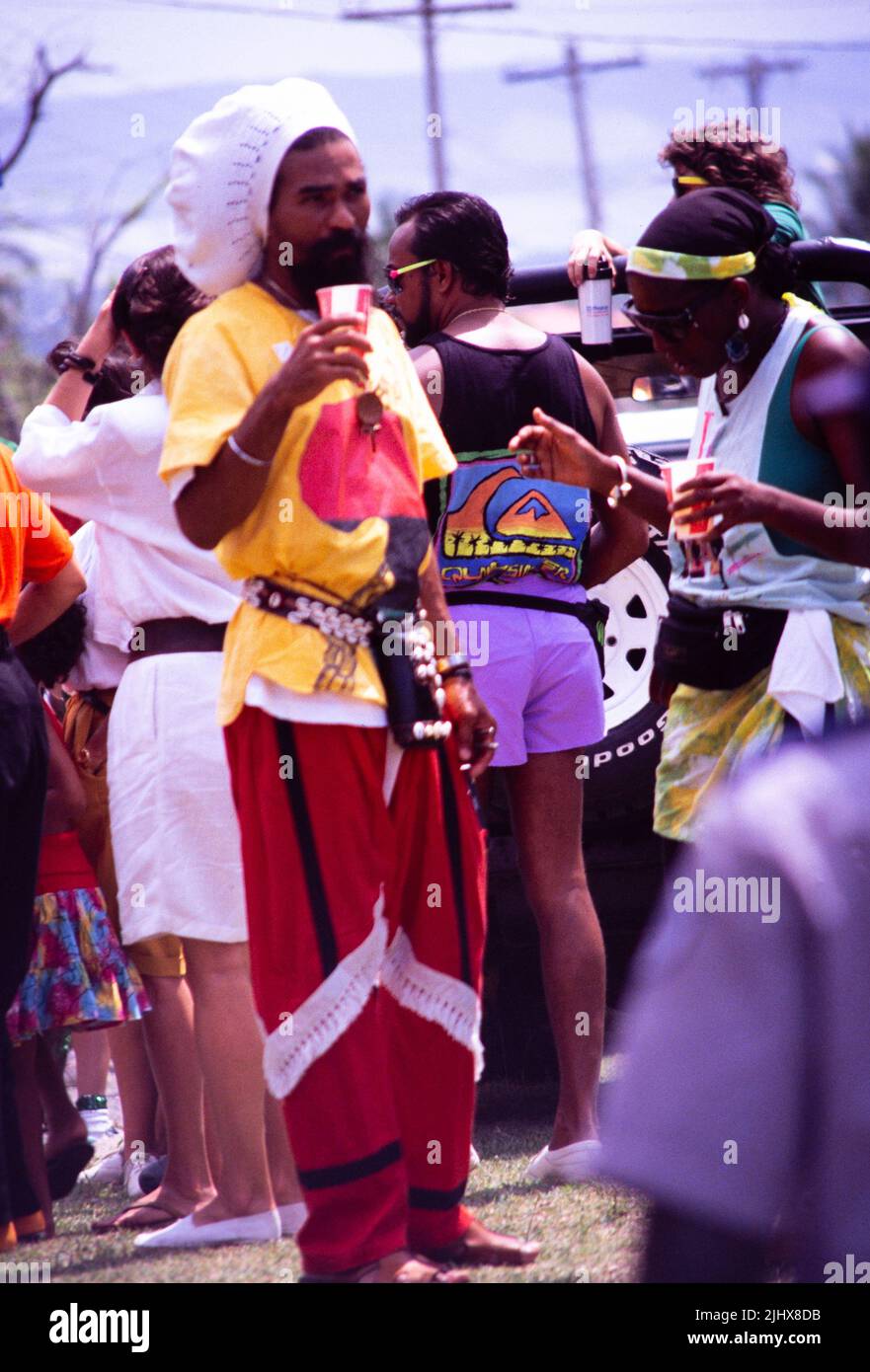 People in procession dancing on streets at Easter carnival, Kingston