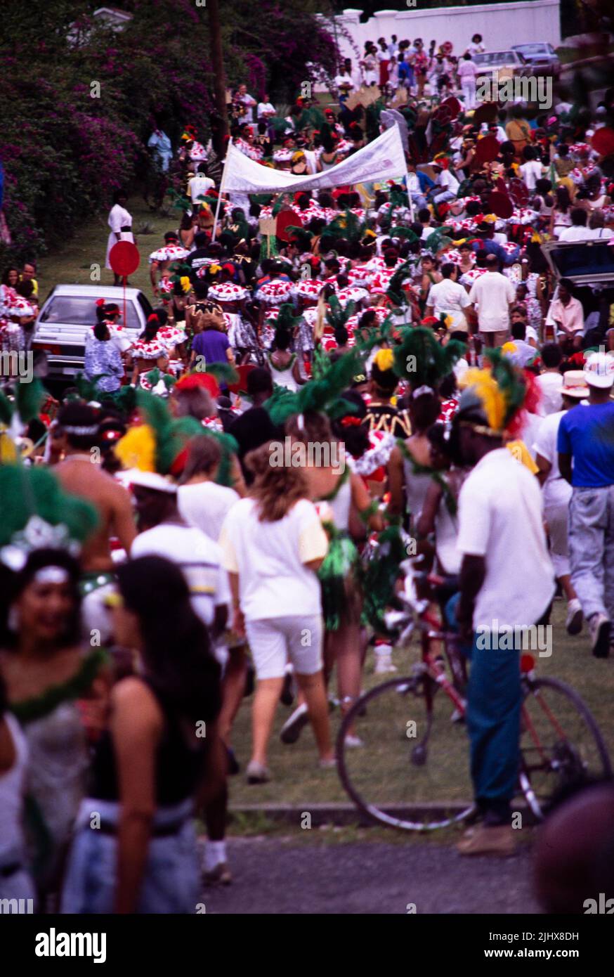 People in procession dancing on streets at Easter carnival, Kingston