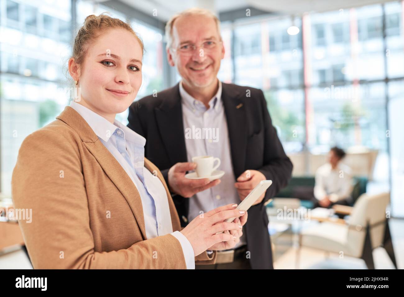 Young businesswoman with tablet computer as IT security officer in the office Stock Photo