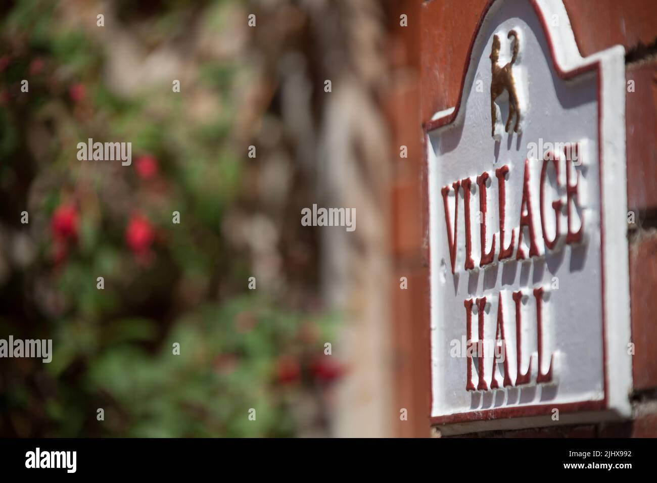 Village of Eccleston, England. Picturesque close up view of the Village Hall Eaton Estate sign. Stock Photo