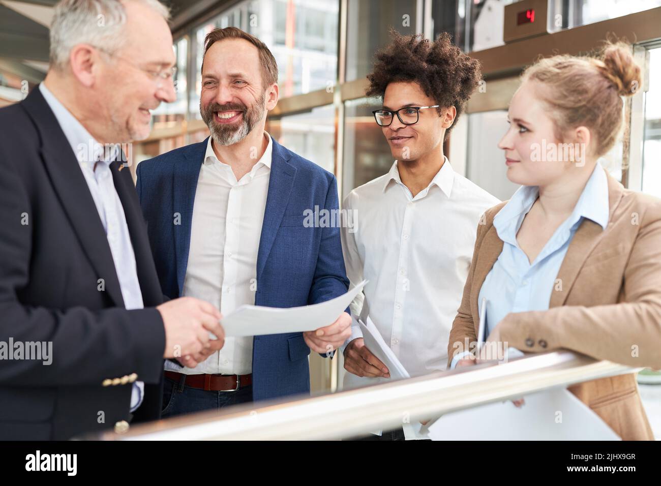 Business people are happy about a new order or a contract Stock Photo