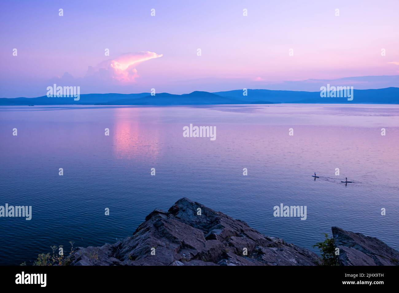 Rocky shore with sunset hi-res stock photography and images - Alamy