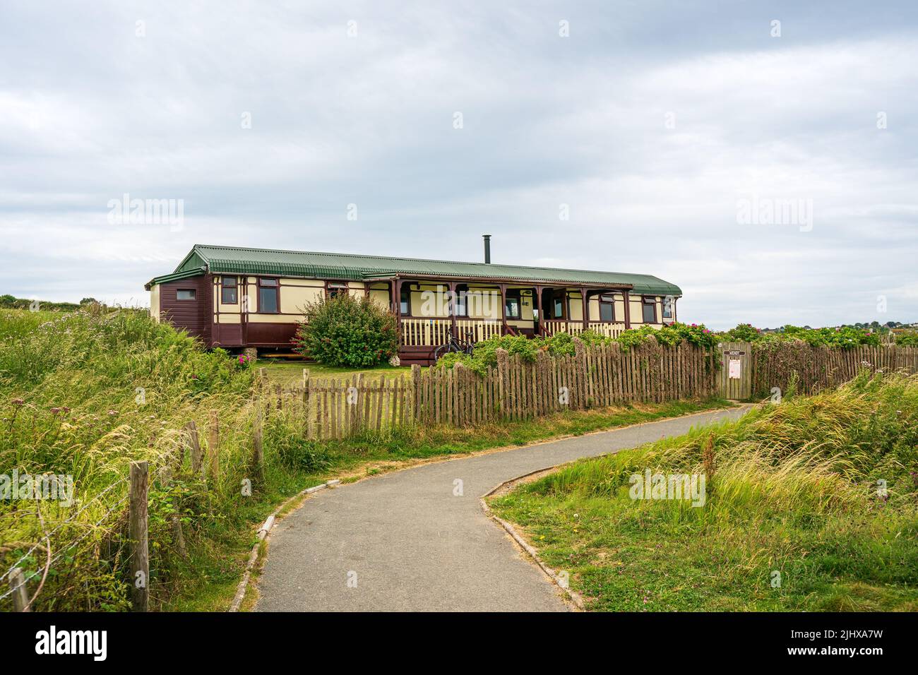 Aberporth Ceredigion Wales UK July 12 2022  Clifftop railway carriage holiday rental accommodation Stock Photo