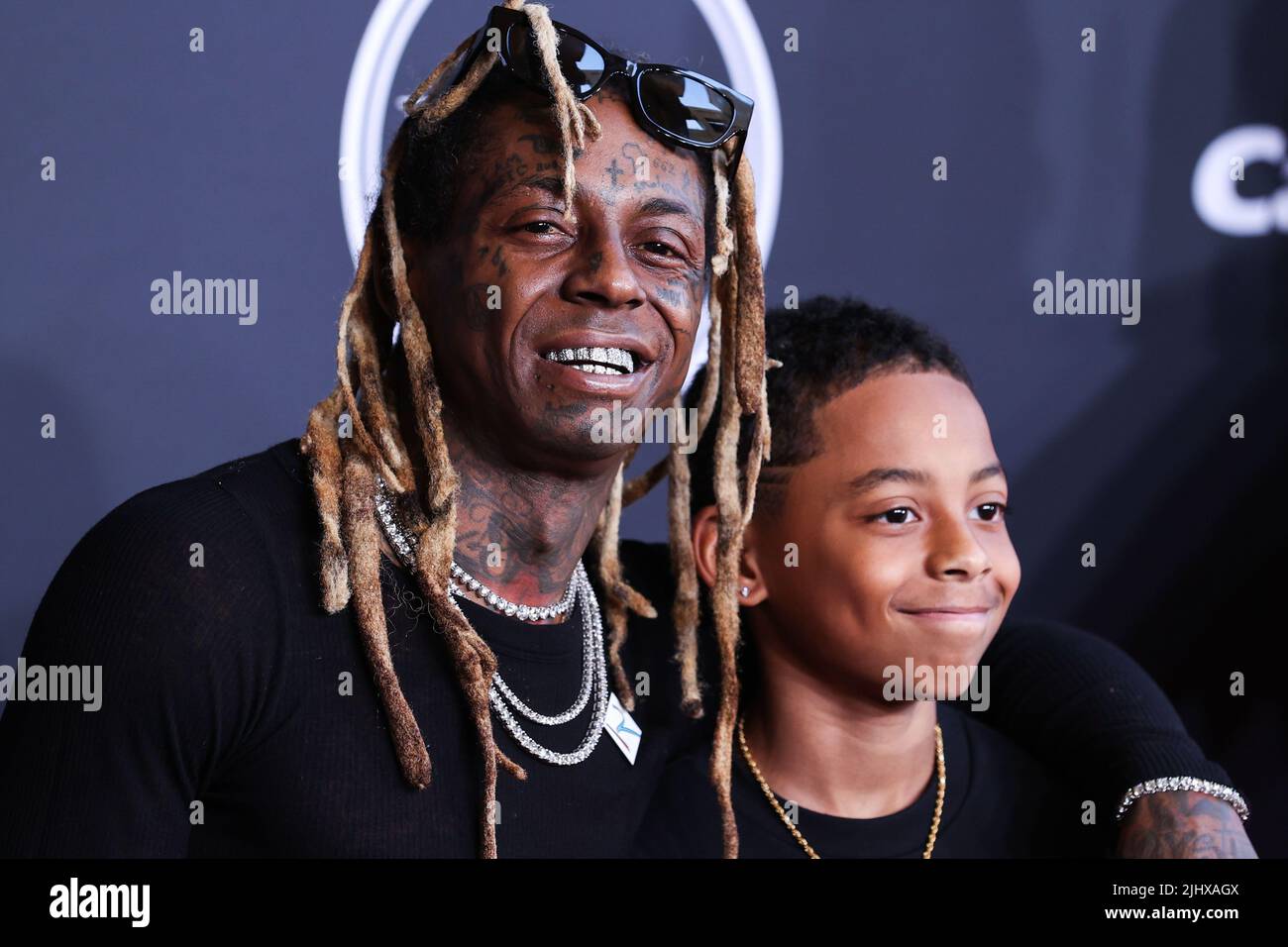 Hollywood, United States. 20th July, 2022. HOLLYWOOD, LOS ANGELES, CALIFORNIA, USA - JULY 20: American rapper Lil Wayne (Dwayne Michael Carter Jr.) and son Kameron Carter arrive at the 2022 ESPY Awards held at the Dolby Theatre on July 20, 2022 in Hollywood, Los Angeles, California, United States. (Photo by Xavier Collin/Image Press Agency) Credit: Image Press Agency/Alamy Live News Stock Photo