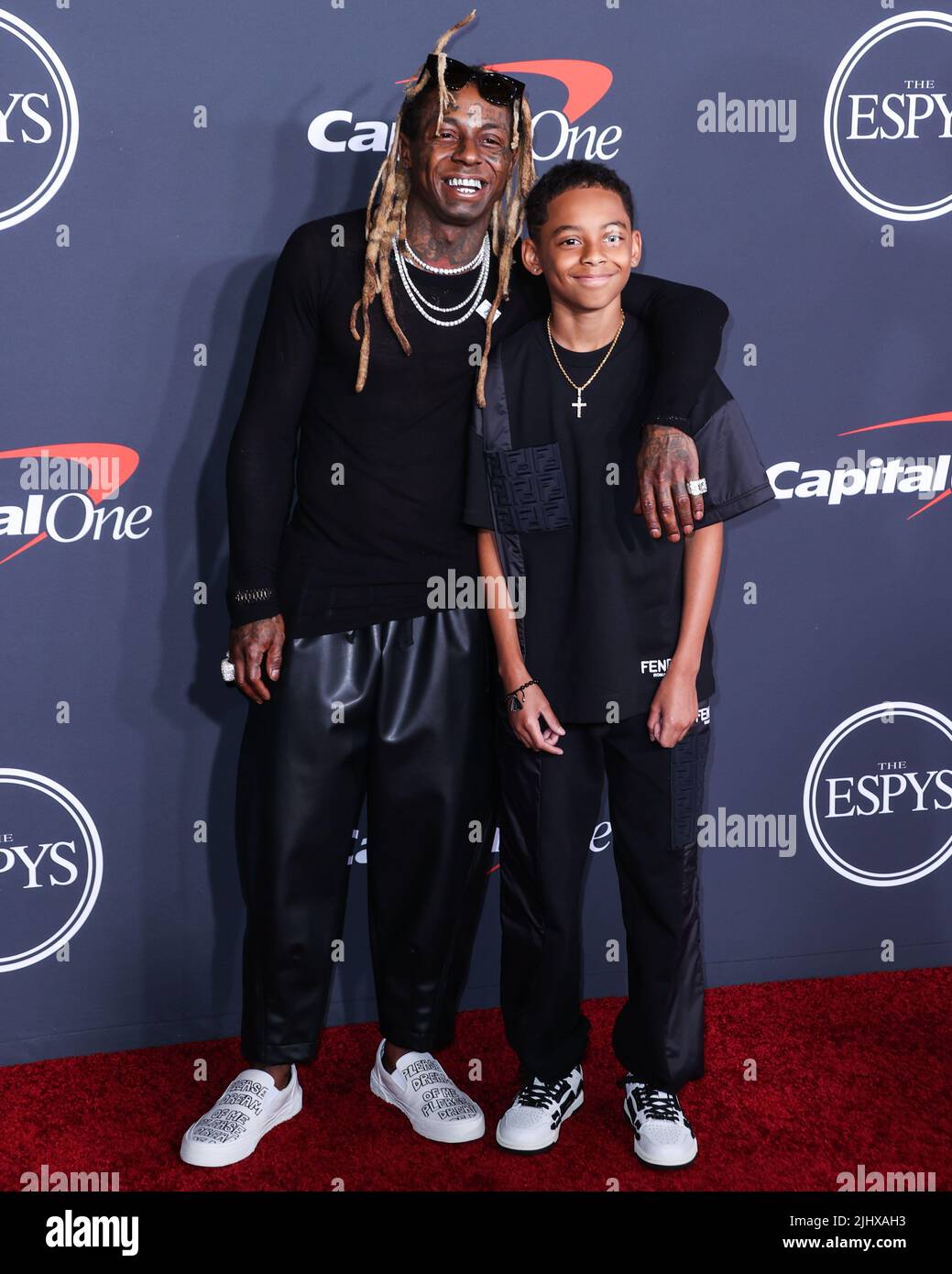 Hollywood, United States. 20th July, 2022. HOLLYWOOD, LOS ANGELES, CALIFORNIA, USA - JULY 20: American rapper Lil Wayne (Dwayne Michael Carter Jr.) and son Kameron Carter arrive at the 2022 ESPY Awards held at the Dolby Theatre on July 20, 2022 in Hollywood, Los Angeles, California, United States. (Photo by Xavier Collin/Image Press Agency) Credit: Image Press Agency/Alamy Live News Stock Photo