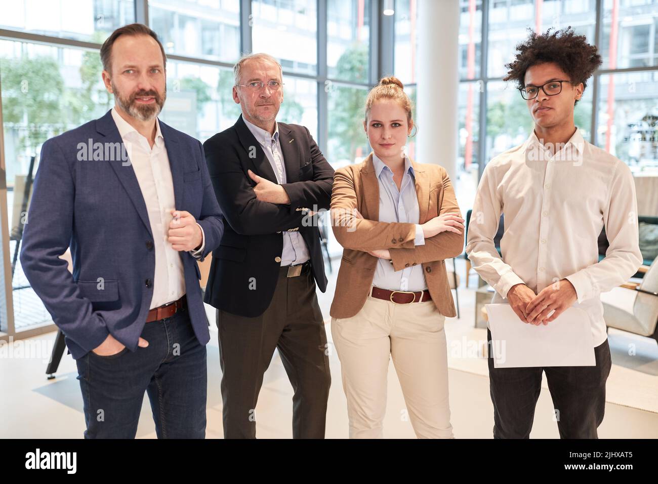 Successful and competent business team with managers and trainees in the office Stock Photo