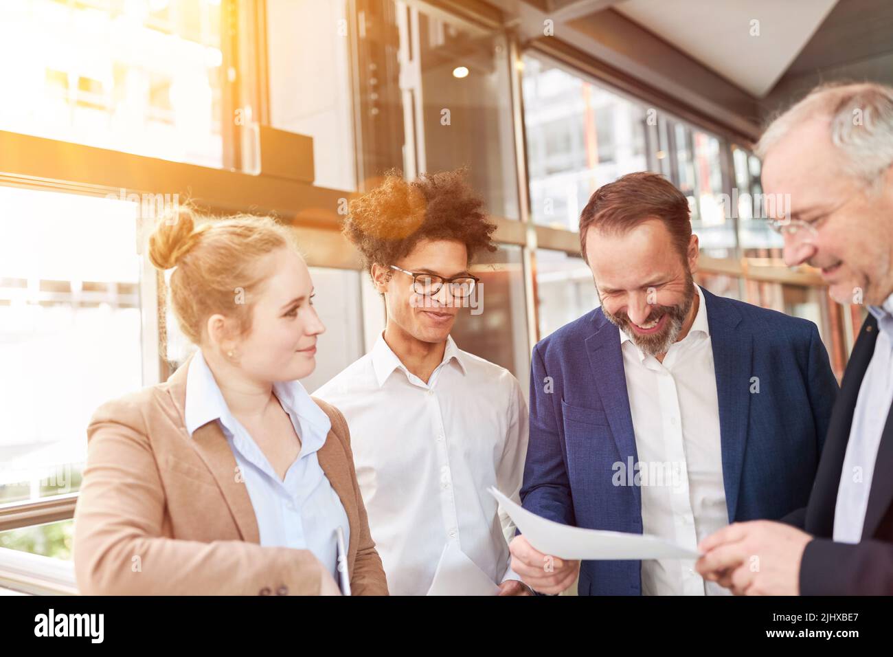 Successful business team is happy about contract for agency order Stock Photo