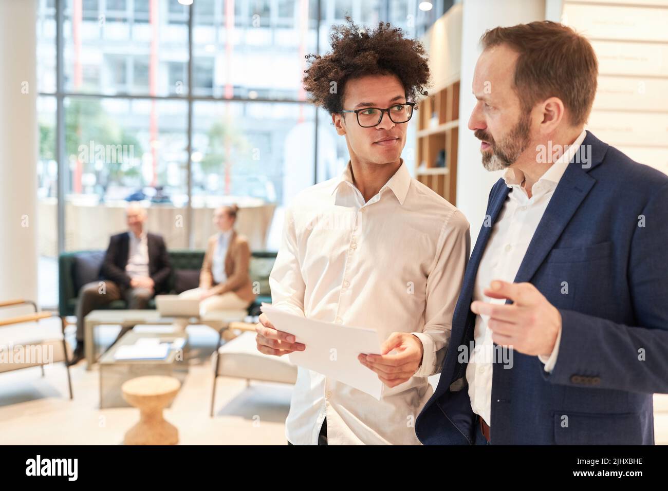 Young business man as a start-up founder and manager in a negotiation or consultation Stock Photo