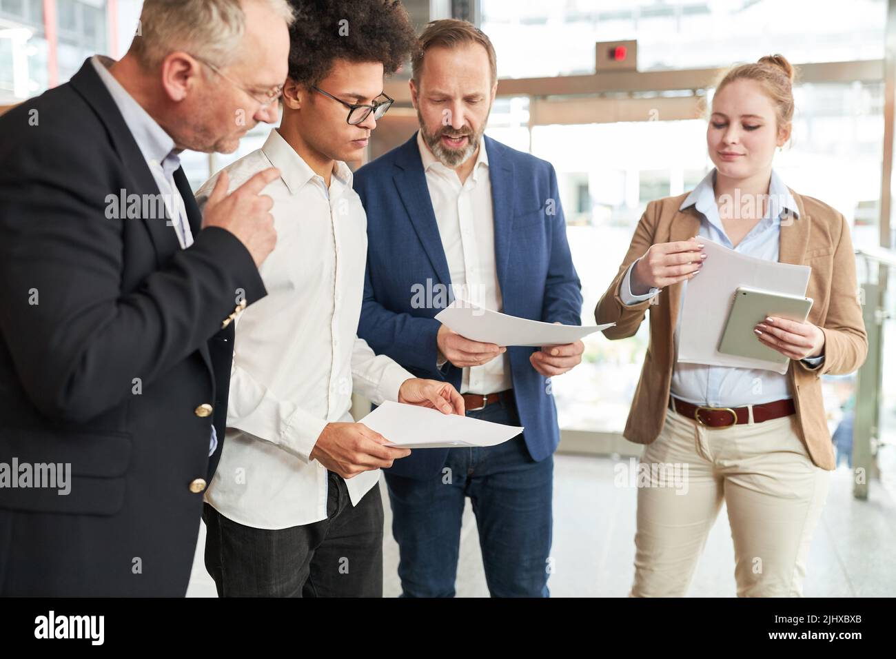 Startup business team and consulting consultants analyzing project documents Stock Photo