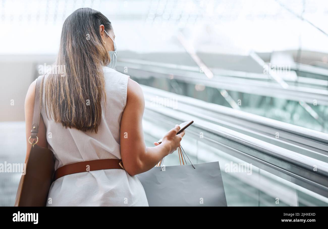 Woman and texting and rear view hi-res stock photography and images - Alamy