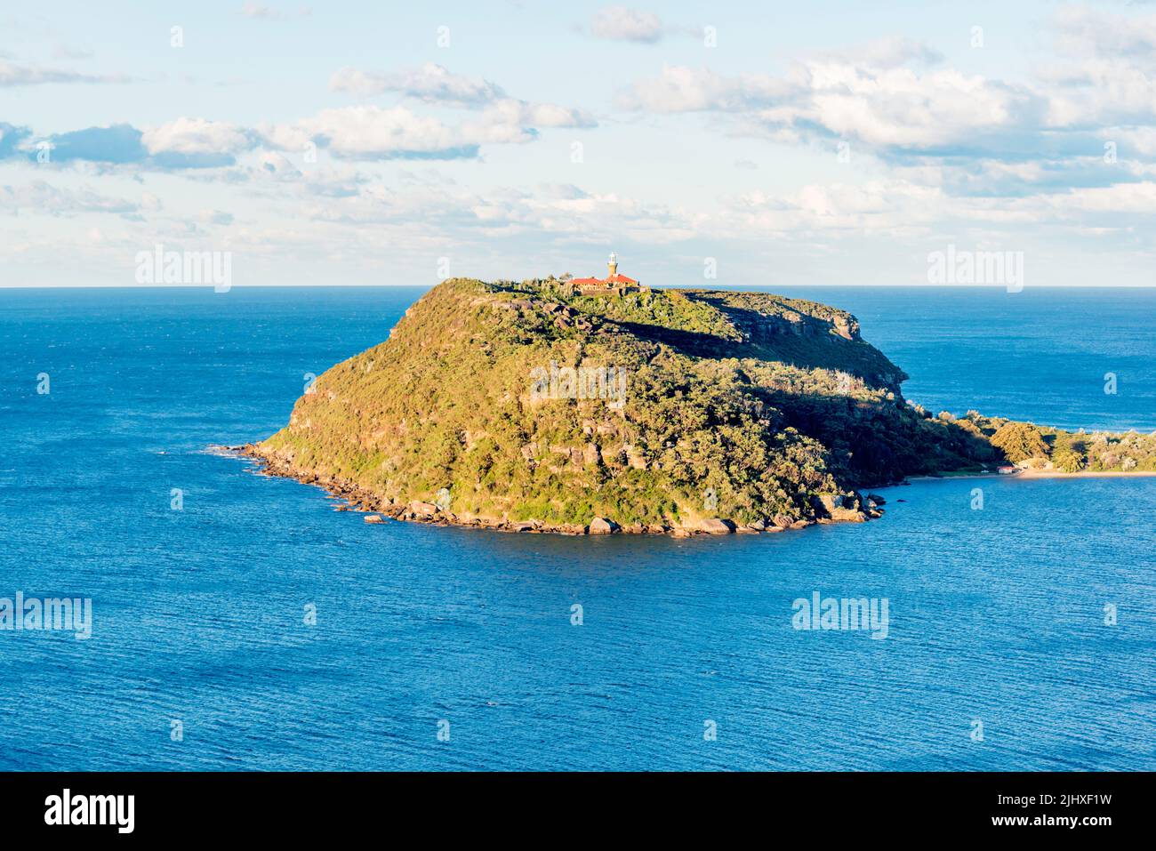The 1881 historic Barrenjoey Head Lighthouse at the northern end of Palm Beach and Pittwater in Sydney Australia in the late afternoon winter sun Stock Photo