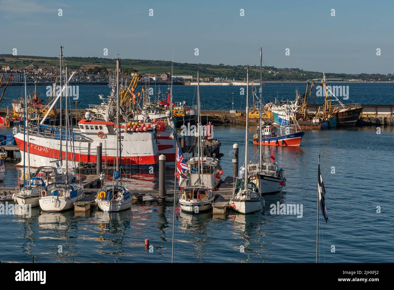 Newlyn Harbour, Penzance, Cornwall, England, UK. 2022. Commercial fishing boats and leisure craft in port at Newlyn Harbour, Stock Photo
