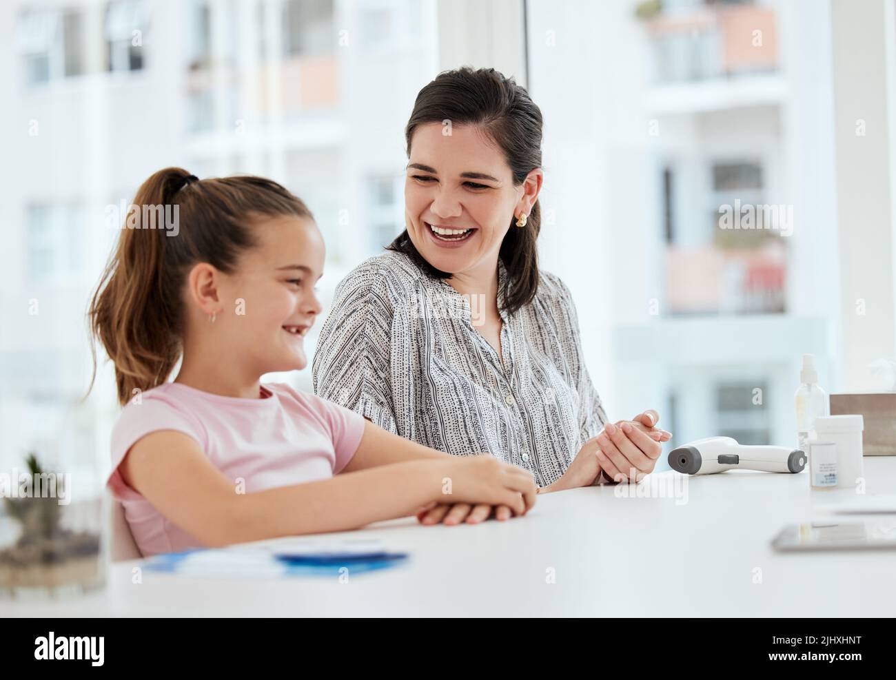 Are you ready for this. a mother and daughter at a checkup at a hospital. Stock Photo