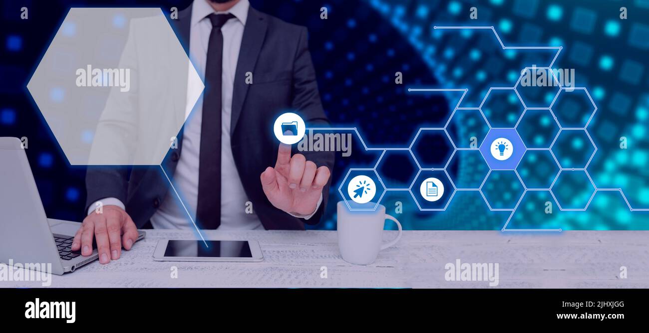Businessman With A Laptop And A Tablet With Hand Pointing On A Pattern ...