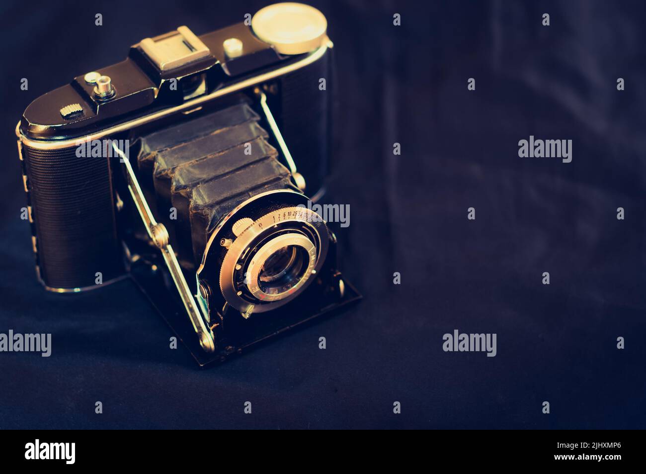 Vintage analog medium format film camera close up view. Vintage film camera with bellows. Stock Photo