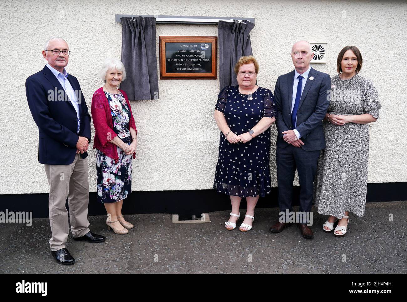 Children of bus driver Jackie Gibson (from left) Robert Gibson, Hilary Magowan, Lynda Van Cuylenburg, Stephen Gibson and Dorothy Crockard, at an event with some of their father's former colleagues in Ulsterbus and current drivers to unveil a plaque at the depot in Ballygowan where he began his journey on Bloody Friday. Jackie was killed in the bomb that detonated at the Oxford Street bus station on July 21 1972. Picture date: Thursday July 21, 2022. Stock Photo