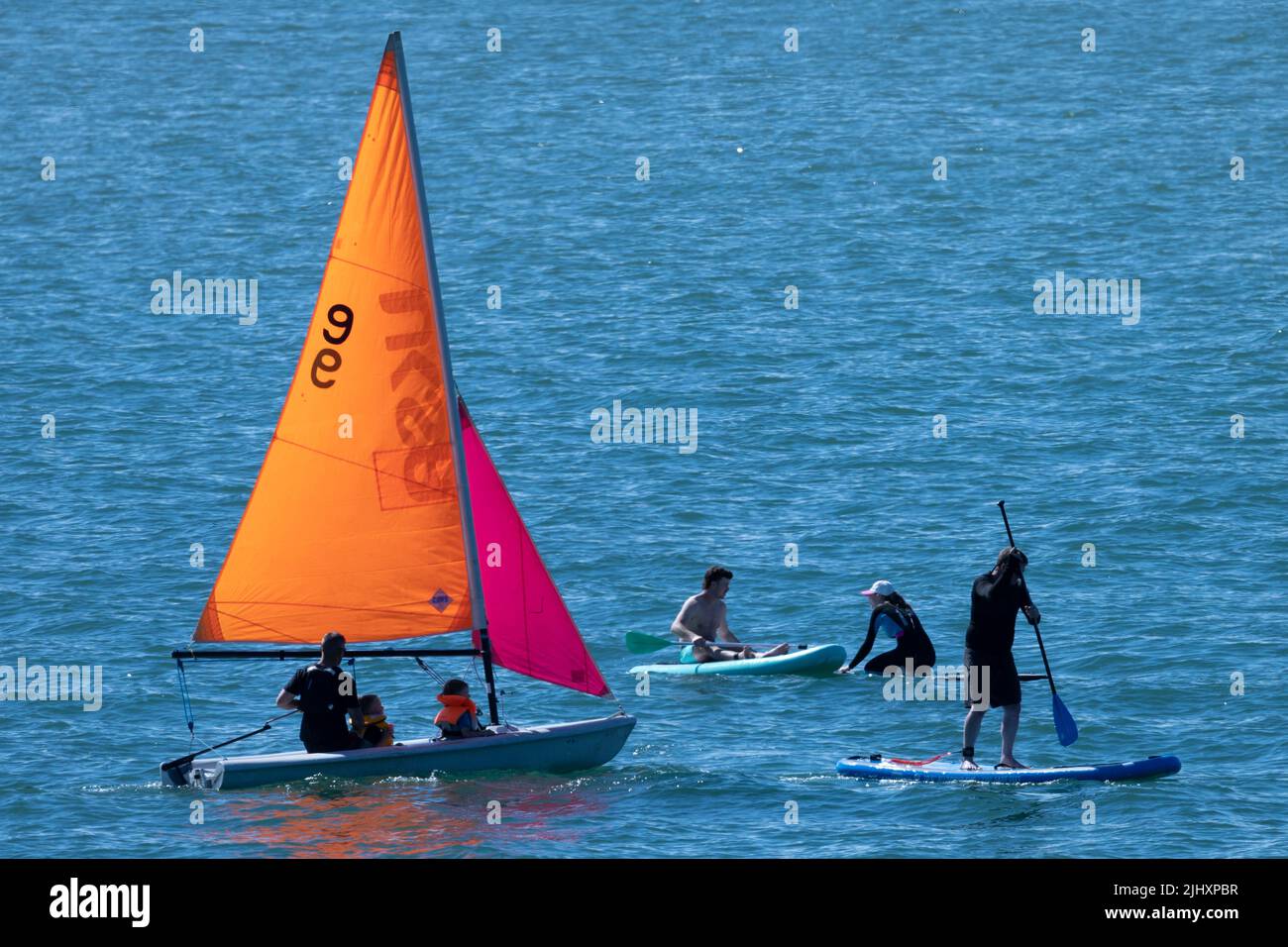 Paddle,board,beach,sea,dinghy,water,sports,sport,Gurnard,Isle of Wight,England,UK,Britain,British, Stock Photo