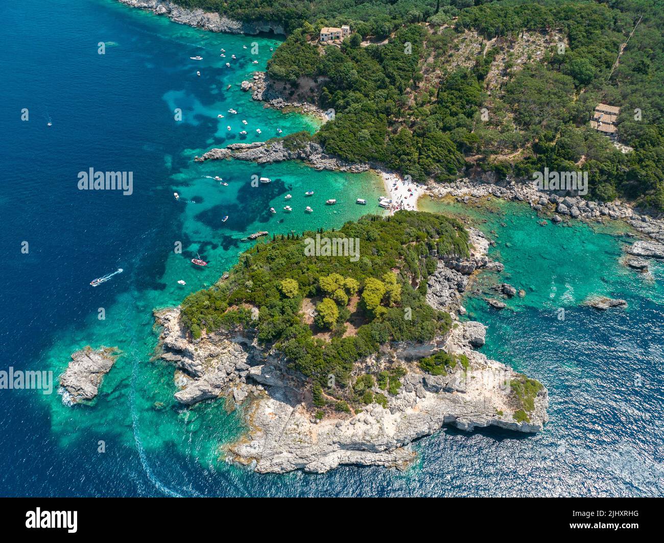 Aerial view of Limni Beach Glyko, on the island of Corfu. Greece. Where the two beaches are connected to the mainland providing a wonderful scenery Stock Photo